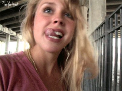 crazy blonde teen giving blowjob in public